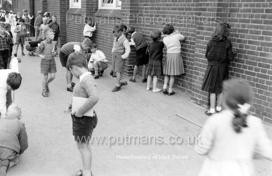 Ref D4 Children measuring height of school building c1955